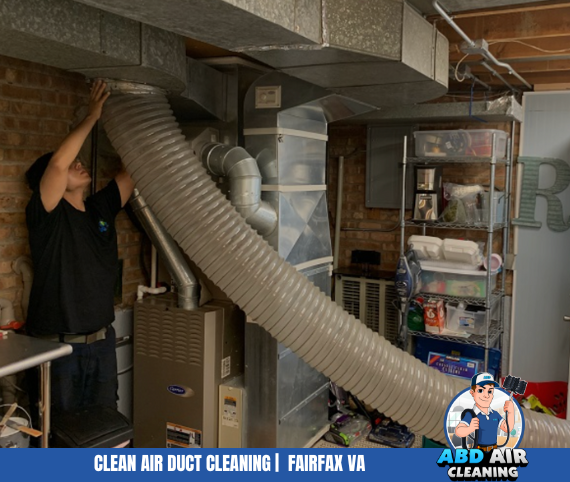 Technician cleaning return air ducts in fairfax virginia